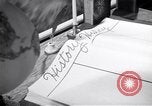 Image of large volume titled history on desk United States USA, 1951, second 62 stock footage video 65675032397