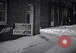 Image of Policeman checking building security United States USA, 1951, second 4 stock footage video 65675032416