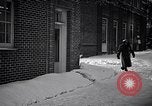 Image of Policeman checking building security United States USA, 1951, second 16 stock footage video 65675032416