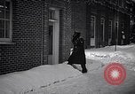 Image of Policeman checking building security United States USA, 1951, second 21 stock footage video 65675032416