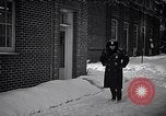 Image of Policeman checking building security United States USA, 1951, second 26 stock footage video 65675032416