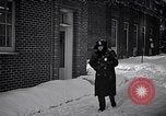 Image of Policeman checking building security United States USA, 1951, second 27 stock footage video 65675032416