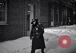 Image of Policeman checking building security United States USA, 1951, second 28 stock footage video 65675032416