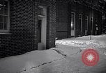Image of Policeman checking building security United States USA, 1951, second 32 stock footage video 65675032416