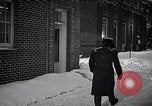 Image of Policeman checking building security United States USA, 1951, second 42 stock footage video 65675032416
