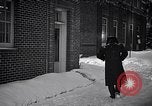 Image of Policeman checking building security United States USA, 1951, second 43 stock footage video 65675032416