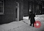 Image of Policeman checking building security United States USA, 1951, second 44 stock footage video 65675032416