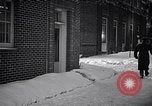 Image of Policeman checking building security United States USA, 1951, second 52 stock footage video 65675032416