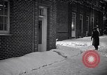 Image of Policeman checking building security United States USA, 1951, second 55 stock footage video 65675032416