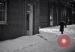 Image of Policeman checking building security United States USA, 1951, second 56 stock footage video 65675032416