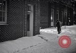 Image of Policeman checking building security United States USA, 1951, second 57 stock footage video 65675032416