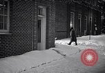 Image of Policeman checking building security United States USA, 1951, second 58 stock footage video 65675032416