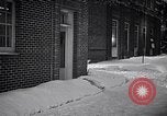 Image of Policeman checking building security United States USA, 1951, second 62 stock footage video 65675032416