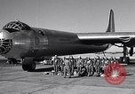 Image of pre-flight inspection of Convair B-36 and crew Fort Worth Texas USA, 1951, second 3 stock footage video 65675032420