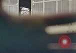 Standbild Fire Guard für Flugzeuge Starten des Motors Honolulu Hawaii USA, 1959, aus Sekunde 27 historischem Filmmaterial Videoclip 65675032481