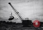 Image of electrical power plant Ireland, 1950, second 28 stock footage video 65675032544