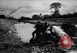 Image of electrical power plant Ireland, 1950, second 32 stock footage video 65675032544