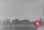Standbild ein Mann lofted in der Luft von einem Flugzeug Thomasville Georgia United States USA, 1935, aus Sekunde 5 historischem Filmmaterial Videoclip 65675032574