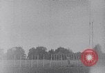 Standbild ein Mann lofted in der Luft von einem Flugzeug Thomasville Georgia United States USA, 1935, aus Sekunde 7 historischem Filmmaterial Videoclip 65675032574