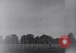 Standbild ein Mann lofted in der Luft von einem Flugzeug Thomasville Georgia United States USA, 1935, aus Sekunde 9 historischem Filmmaterial Videoclip 65675032574