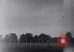 Standbild ein Mann lofted in der Luft von einem Flugzeug Thomasville Georgia United States USA, 1935, aus Sekunde 12 historischem Filmmaterial Videoclip 65675032574
