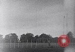 Standbild ein Mann lofted in der Luft von einem Flugzeug Thomasville Georgia United States USA, 1935, aus Sekunde 13 historischem Filmmaterial Videoclip 65675032574