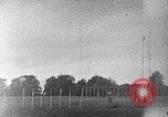 Standbild ein Mann lofted in der Luft von einem Flugzeug Thomasville Georgia United States USA, 1935, aus Sekunde 14 historischem Filmmaterial Videoclip 65675032574