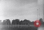 Standbild ein Mann lofted in der Luft von einem Flugzeug Thomasville Georgia United States USA, 1935, aus Sekunde 17 historischem Filmmaterial Videoclip 65675032574