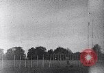 Standbild ein Mann lofted in der Luft von einem Flugzeug Thomasville Georgia United States USA, 1935, aus Sekunde 20 historischem Filmmaterial Videoclip 65675032574