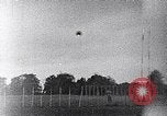 Standbild ein Mann lofted in der Luft von einem Flugzeug Thomasville Georgia United States USA, 1935, aus Sekunde 22 historischem Filmmaterial Videoclip 65675032574