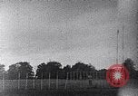 Standbild ein Mann lofted in der Luft von einem Flugzeug Thomasville Georgia United States USA, 1935, aus Sekunde 26 historischem Filmmaterial Videoclip 65675032574