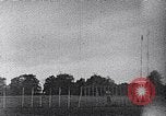 Standbild ein Mann lofted in der Luft von einem Flugzeug Thomasville Georgia United States USA, 1935, aus Sekunde 28 historischem Filmmaterial Videoclip 65675032574