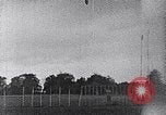 Standbild ein Mann lofted in der Luft von einem Flugzeug Thomasville Georgia United States USA, 1935, aus Sekunde 33 historischem Filmmaterial Videoclip 65675032574