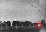 Standbild ein Mann lofted in der Luft von einem Flugzeug Thomasville Georgia United States USA, 1935, aus Sekunde 34 historischem Filmmaterial Videoclip 65675032574