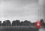 Standbild ein Mann lofted in der Luft von einem Flugzeug Thomasville Georgia United States USA, 1935, aus Sekunde 42 historischem Filmmaterial Videoclip 65675032574