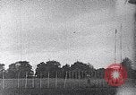 Standbild ein Mann lofted in der Luft von einem Flugzeug Thomasville Georgia United States USA, 1935, aus Sekunde 43 historischem Filmmaterial Videoclip 65675032574