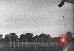 Standbild ein Mann lofted in der Luft von einem Flugzeug Thomasville Georgia United States USA, 1935, aus Sekunde 45 historischem Filmmaterial Videoclip 65675032574