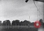 Standbild ein Mann lofted in der Luft von einem Flugzeug Thomasville Georgia United States USA, 1935, aus Sekunde 47 historischem Filmmaterial Videoclip 65675032574
