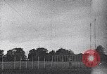 Standbild ein Mann lofted in der Luft von einem Flugzeug Thomasville Georgia United States USA, 1935, aus Sekunde 58 historischem Filmmaterial Videoclip 65675032574