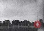 Standbild ein Mann lofted in der Luft von einem Flugzeug Thomasville Georgia United States USA, 1935, aus Sekunde 61 historischem Filmmaterial Videoclip 65675032574