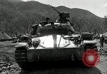 Standbild amerikanische M24 Chaffee Tanks Korea, 1951, aus Sekunde 37 historischem Filmmaterial Videoclip 65675032632