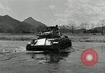 Standbild amerikanische M24 Chaffee Tanks Korea, 1951, aus Sekunde 53 historischem Filmmaterial Videoclip 65675032632