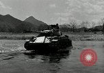 Standbild amerikanische M24 Chaffee Tanks Korea, 1951, aus Sekunde 54 historischem Filmmaterial Videoclip 65675032632