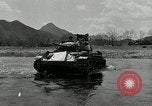 Standbild amerikanische M24 Chaffee Tanks Korea, 1951, aus Sekunde 56 historischem Filmmaterial Videoclip 65675032632