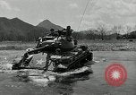 Standbild amerikanische M24 Chaffee Tanks Korea, 1951, aus Sekunde 59 historischem Filmmaterial Videoclip 65675032632
