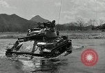 Standbild amerikanische M24 Chaffee Tanks Korea, 1951, aus Sekunde 60 historischem Filmmaterial Videoclip 65675032632