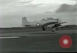 Standbild T-28 Trojan Vietnam, 1962, aus Sekunde 51 historischem Filmmaterial Videoclip 65675032660