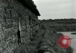 Standbild thatch Hütte Vietnam, 1962, aus Sekunde 6 historischem Filmmaterial Videoclip 65675032664