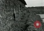 Standbild thatch Hütte Vietnam, 1962, aus Sekunde 10 historischem Filmmaterial Videoclip 65675032664