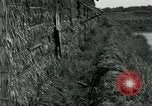 Standbild thatch Hütte Vietnam, 1962, aus Sekunde 13 historischem Filmmaterial Videoclip 65675032664